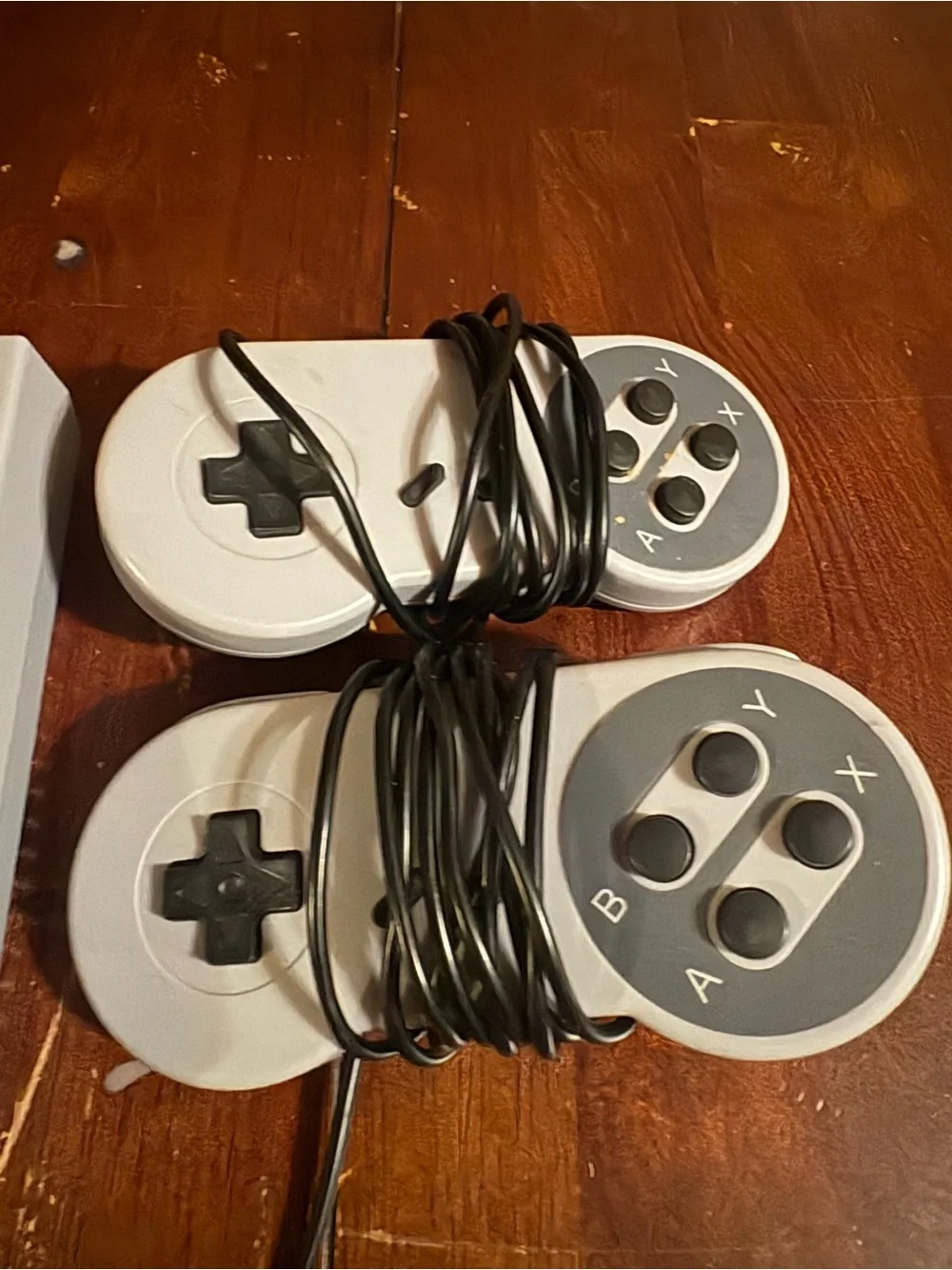 Nintendo Mini Gaming Console in Gray with Purple Buttons and Gray Controllers